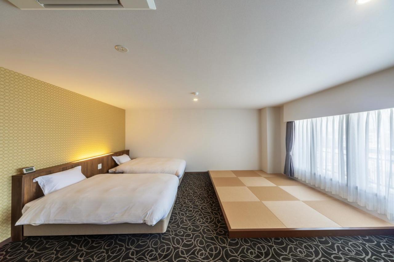 Suikouen Hotel Куруме Екстериор снимка