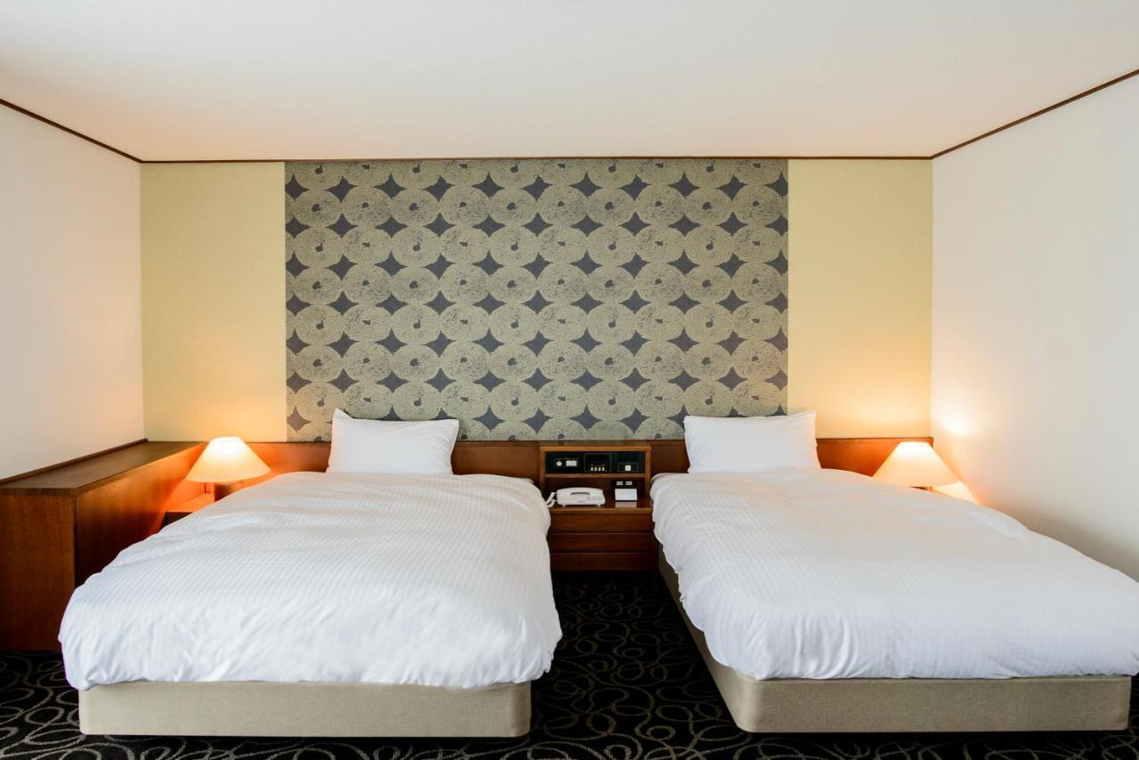 Suikouen Hotel Куруме Екстериор снимка